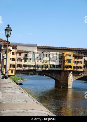 The Ponte Vecchio /Old Bridge/ is a Medieval bridge over the Arno River, in Florence, Italy Stock Photo