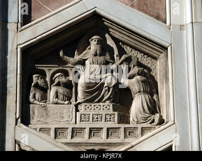 Florence - The hexagonal Relief on the Giottos' Campanile.The hexagonal panels on the lower level depict the history of mankind, inspired by Genesis. Stock Photo