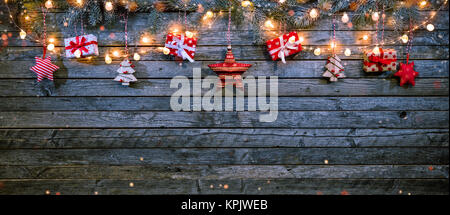 Christmas background with wooden decorations and spot lights. Free space for text. Celebration and decorative design. Very high resolution Stock Photo