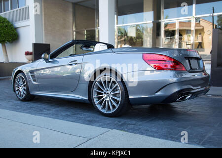 Mercedes SL 450 Convertible - Grey Exterior Back/Side Angle Stock Photo