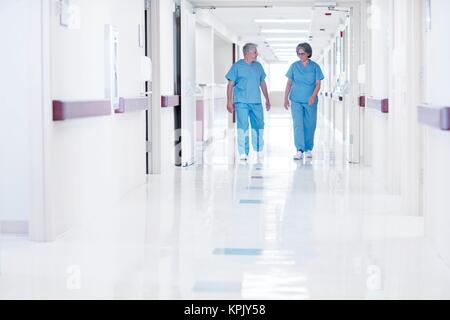 Two doctors wearing surgical scrubs. Stock Photo