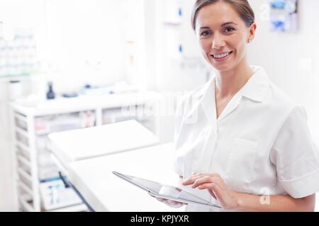 Female doctor using digital tablet. Stock Photo