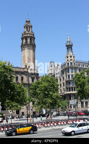 Bicing station, bicycles only sharing system with parked bicyles in front of Main Correos Post Office building, next to an apartment building, Barcelo Stock Photo