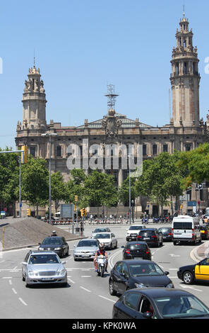 Bicing station, bicycles only sharing system with parked bicycles in front of Main Correos Post Office building, Barcelona, Spain. Stock Photo