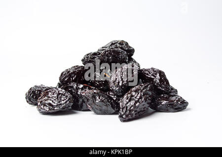 Dried plum fruits on white background isolated Stock Photo