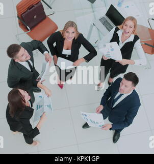 View from the top: happy colleagues celebrating their win Stock Photo