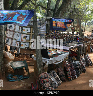 Hawker stall selling wooden carvings and sculptures on roadside, Kingdom of Swaziland. Stock Photo
