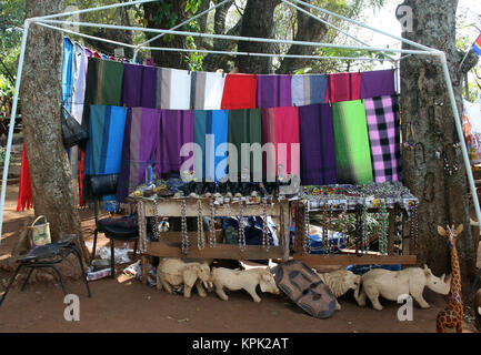 Hawker stall selling wooden carvings and sculptures on roadside, Kingdom of Swaziland. Stock Photo