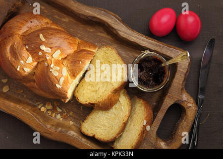 Easter sweet brioche on wooden tray Stock Photo