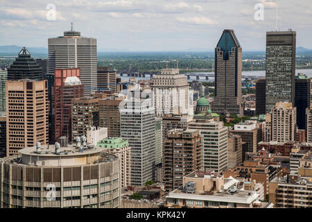 View over the city of Montreal with the downtown area, office buildings, condominiums and the river; Montreal, Quebec, Canada Stock Photo