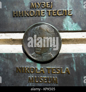 Close-up of a sign and portrait at the Nikola Tesla Museum; Belgrade, Vojvodina, Serbia Stock Photo