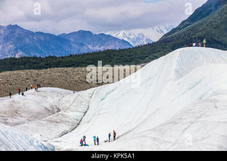 Guided groups recreate on Root Glacier in Wrangell-St. Elias National Park; Alaska, United States of America Stock Photo