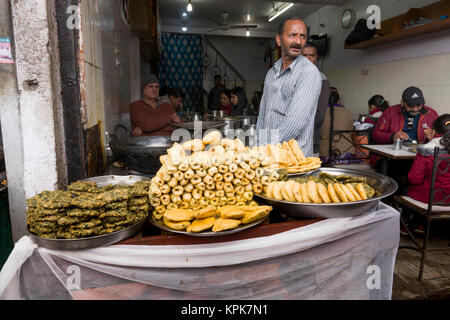 Fried Indian street food on lower Bazaar market in Shimla, India Stock Photo