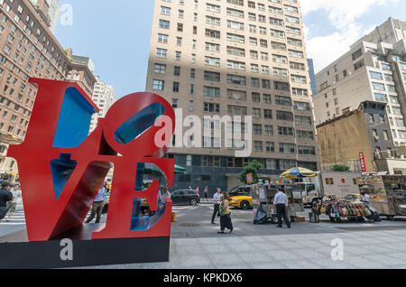 NEW YORK CITY - JULY 12: Love sculpture on July 12, 2012 in New York. LOVE is a sculpture by American artist Robert Indiana. It consists of the letter Stock Photo