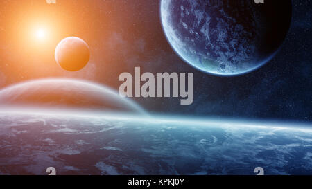 Sunrise over planets in space Stock Photo