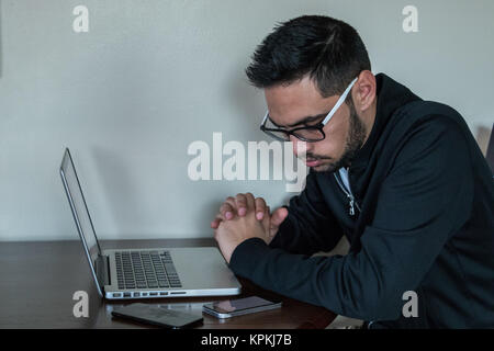 Young business man multitasking Stock Photo