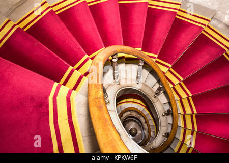 Stairwell in the Polish palace. Royal castle in Warsaw. Red carpet.