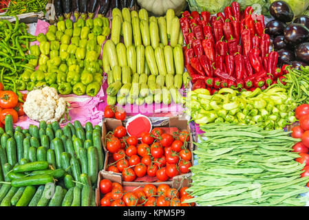 green and red vegetables on a market in istanbul Stock Photo