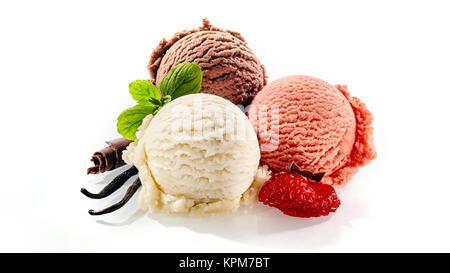 Three single scoops of strawberry vanilla and chocolate dessert decorated with cut fruit and mint leaves on a white background Stock Photo