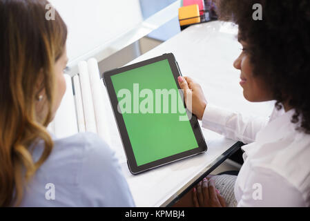 Women Architect Using Tablet PC With Green Screen Stock Photo