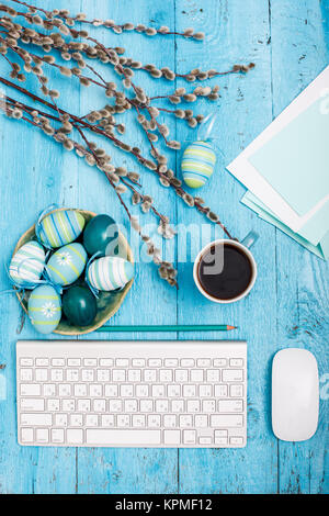 The top view of easter on wooden table office workplace Stock Photo