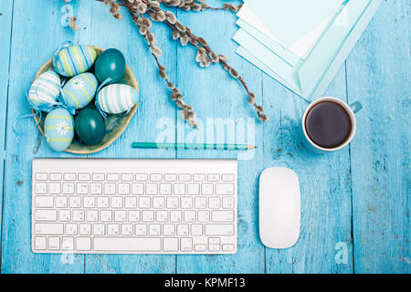 The top view of easter on wooden table office workplace Stock Photo