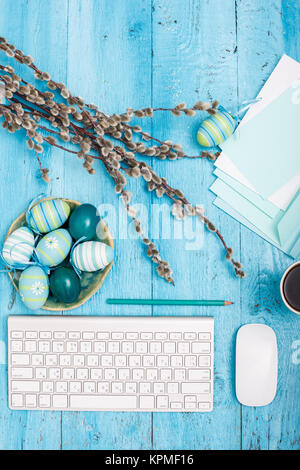 The top view of easter on wooden table office workplace Stock Photo