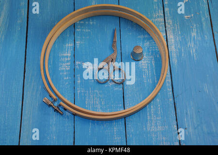 Hoop, thimble, scissors for needlework Stock Photo
