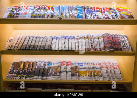 Bangkok, Thailand.  International Newspapers and Magazines, Suvarnabhumi Airport Departure Lounge. Stock Photo