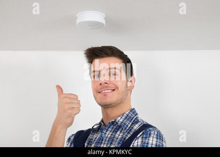 Portrait Of Happy Male Electrician Stock Photo