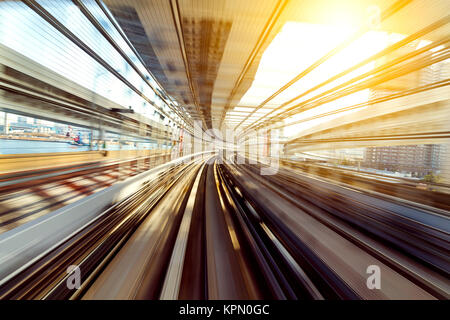 Train moving fast in tunnel Stock Photo