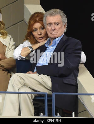 FLUSHING NY- SEPTEMBER 04:  Regis Philbin, Joy Philbin  Day eleven of the 2014 US Open at the USTA Billie Jean King National Tennis Center on September 4, 2014 in the Flushing neighborhood of the Queens borough of New York City.   People:  Regis Philbin, Joy Philbin Stock Photo