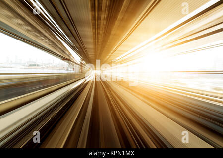 Speedy train passing though tunnel Stock Photo
