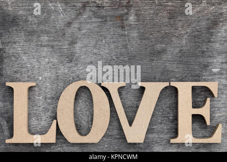 Word love made with wooden block wooden letters Stock Photo