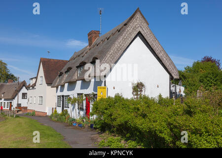 A  thatched cottage for sale in the desirable Essex village of Finchingfield, UK Stock Photo