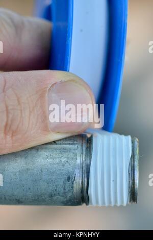 Step by step series on laying irrigation pipe for a home garden, using 19 mm polypipe,  Townsville, Queensland, Australia Stock Photo