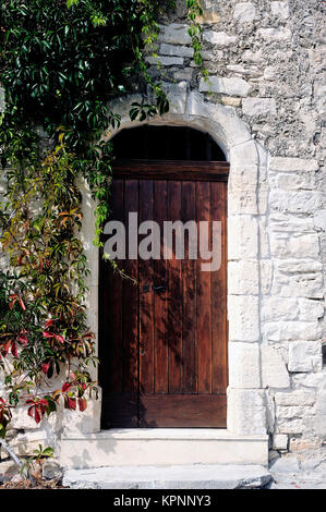 Front door of an old wooden house Stock Photo