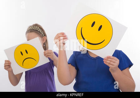 Model release , Trauriges und froehliches Kind, Symbolbild - sad an happy children, symbolic Stock Photo