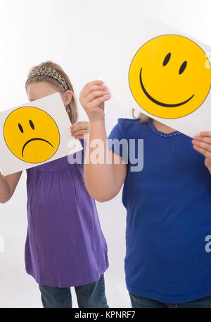 Model release , Trauriges und froehliches Kind, Symbolbild - sad an happy children, symbolic Stock Photo