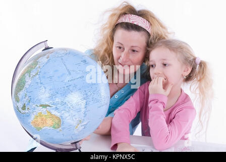 Model release , Mutter und Tochter mit Globus - mother and daughter with globe Stock Photo