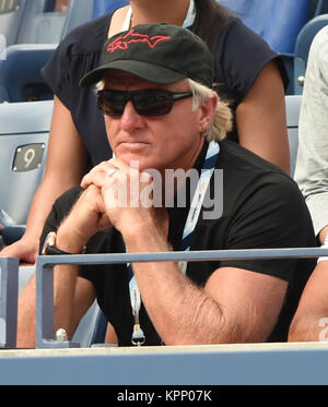 FLUSHING NY- SEPTEMBER 02:  Pro golfer Greg Norman and his wife Kirsten Kutner, Day nine of the 2014 US Open at the USTA Billie Jean King National Tennis Center on September 2, 2014 in the Flushing neighborhood of the Queens borough of New York City   People:  Greg Norman Stock Photo