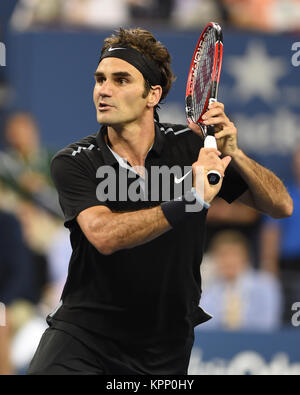 FLUSHING NY- SEPTEMBER 04: Roger Federer defeats Gael Monfils Day ten of the 2014 US Open at the USTA Billie Jean King National Tennis Center on September 3, 2014 in the Flushing neighborhood of the Queens borough of New York City   People:  Roger Federer Stock Photo