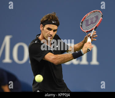 FLUSHING NY- SEPTEMBER 04: Roger Federer defeats Gael Monfils Day ten of the 2014 US Open at the USTA Billie Jean King National Tennis Center on September 3, 2014 in the Flushing neighborhood of the Queens borough of New York City   People:  Roger Federer Stock Photo