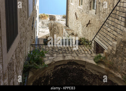 SPLIT,CROATIA - AUGUST 11 2017: Looking up at an ancient building in Split Stock Photo
