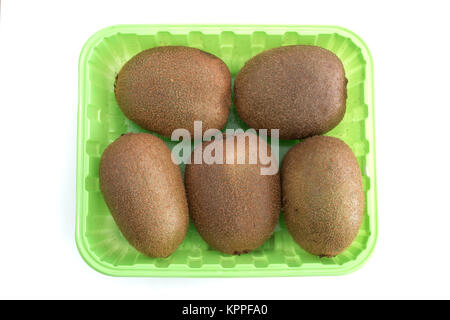 Five Kiwi fruits in a green box isolated on white background Stock Photo