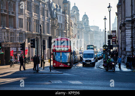 LONDON, UNITED KINGDOM - DECEMBER 12th, 2017: Morning traffic on Whitehall. Whitehall is a road in the City of Westminster, Central London, which form Stock Photo