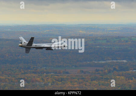 Syracuse, NY – A remotely piloted MQ-9 Reaper operated by the New York Air National Guard’s 174th Attack Wing flies a routine training mission over Central New York on October 23, 2016. The California Air National Guard has been using MQ-9s as an eye-in-the-sky to help firefighters focus their efforts in fighthing the massive Thomas Fire.  (U.S. Air National Guard Stock Photo