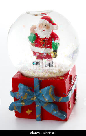 Waterglobe. Christmas waterglobe with Santa Claus. Christmas decoration glass ball water ball globe with snow and Santa Claus. Christmas decoration. Stock Photo