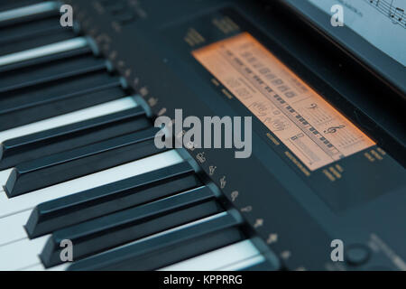 Keys electronic synthesizer close up. Musical instruments Electronic synthesizer piano keyboard isolated on white background with clipping path Stock Photo
