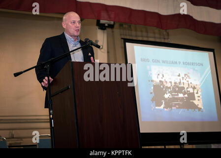 U.S. Air Force Col. Daniel McDonough, the commander of the 182nd Airlift Wing, Illinois Air National Guard, addresses the audience at Brig. Gen. William Robertson’s hail and farewell dinner in Peoria, Ill., Dec. 2, 2017. Robertson was promoted and appointed as the chief of staff for Illinois Air National Guard after commanding the 182nd Airlift Wing for 13 years. (U.S. Air National Guard Stock Photo